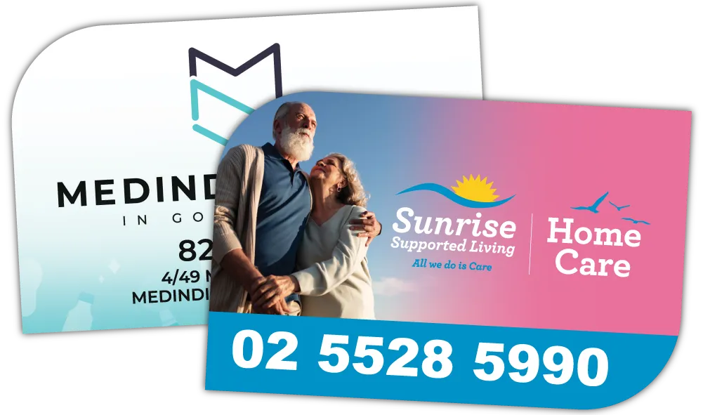 A Pair of Promotional Diagonal Rounded Shaped Fridge Magnets at 90mm x 58mm in size